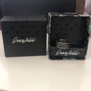 Brand new in box Grace Adele Silver tendril ring. Size 8.   Never worn.